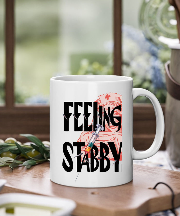 thats what i do iam a nurse and  i stab people ,feeling stabby mug suitable for nurses and people in medical profession ,nursing gift