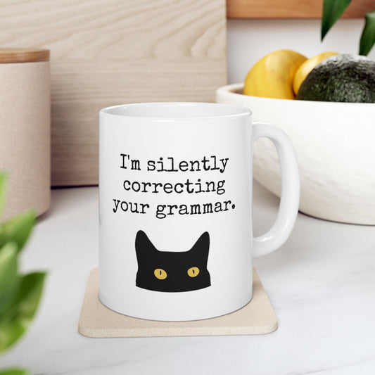 Printify Mug 11oz Grammar Cat Ceramic Mug — “I’m silently correcting your grammar” (11oz )