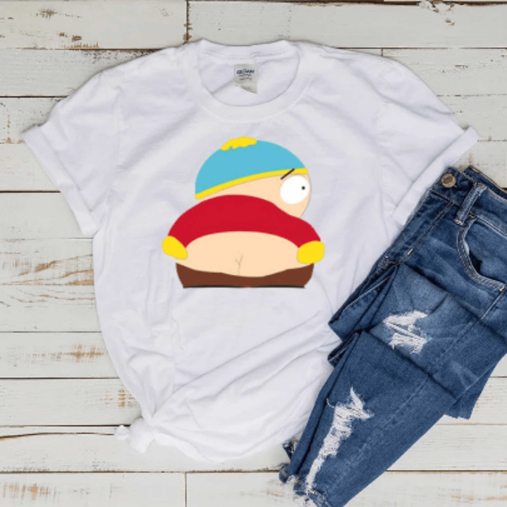 Williamsmugstore southpark shirt eric cartman pulling A moonie t shirt